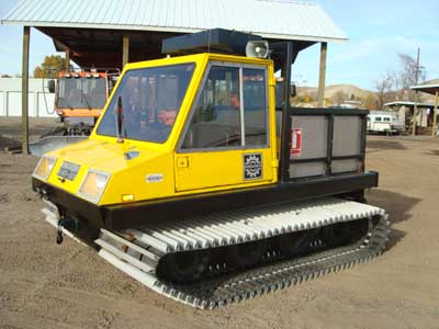 Bombardier BR100 WT Bombardier BR100 WT, 3-man cab, 4 cyl. gas, 4 sp., 396 hours, front hyd., top rack and custom stake bed cargo area