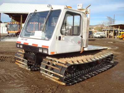 1986 LMC 1500 WT 1986 LMC 1500 WT, 2-man cab with bolt on crew box with bench seats, 6 cyl., AT, fuel injection, foam tires, 2 sp. transfer case, ROPS and new style rebuilt tracks