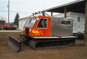 1975 Bombardier 250, 6 cyl., AT., 6-way front blade, full custom cab, 41" tracks, low hours, custom paint. 1975 Bombardier 250, 6 cyl., AT., 6-way front blade, full custom cab, 41" tracks, low hours, custom paint.